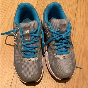 New Balance Gray Sneakers with Blue Highlights